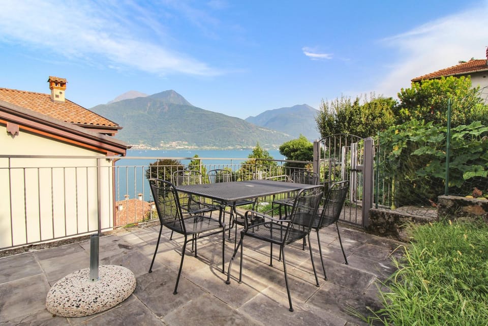 Property building, Patio, Day, Natural landscape, View (from property/room), Balcony/Terrace, Dining area, Lake view, Mountain view