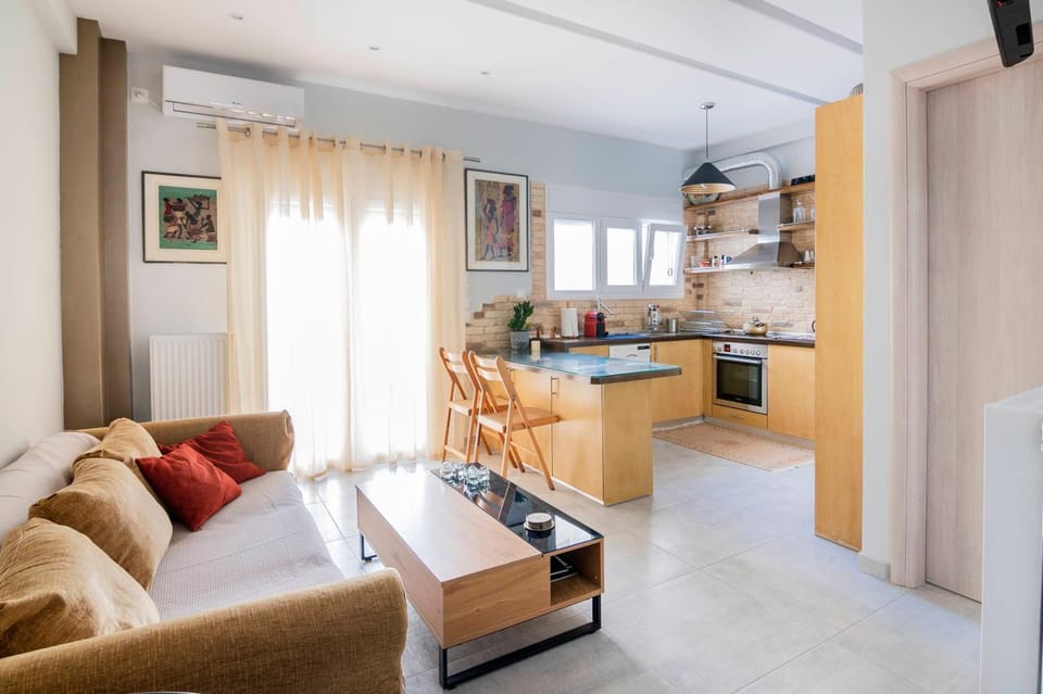 Kitchen or kitchenette, Living room, Seating area, Dining area