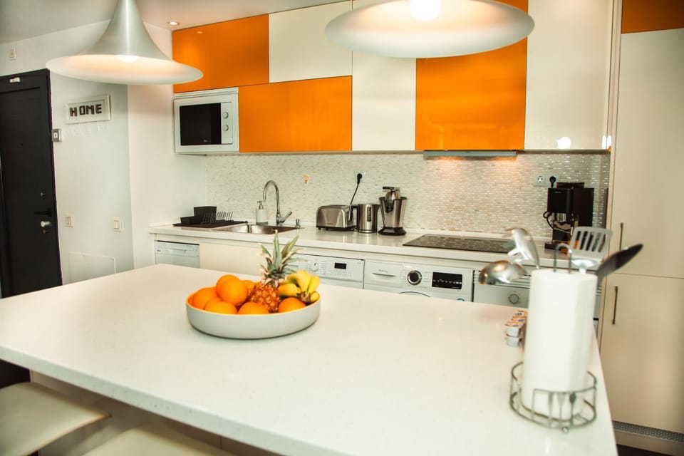 Kitchen or kitchenette, stove, toaster