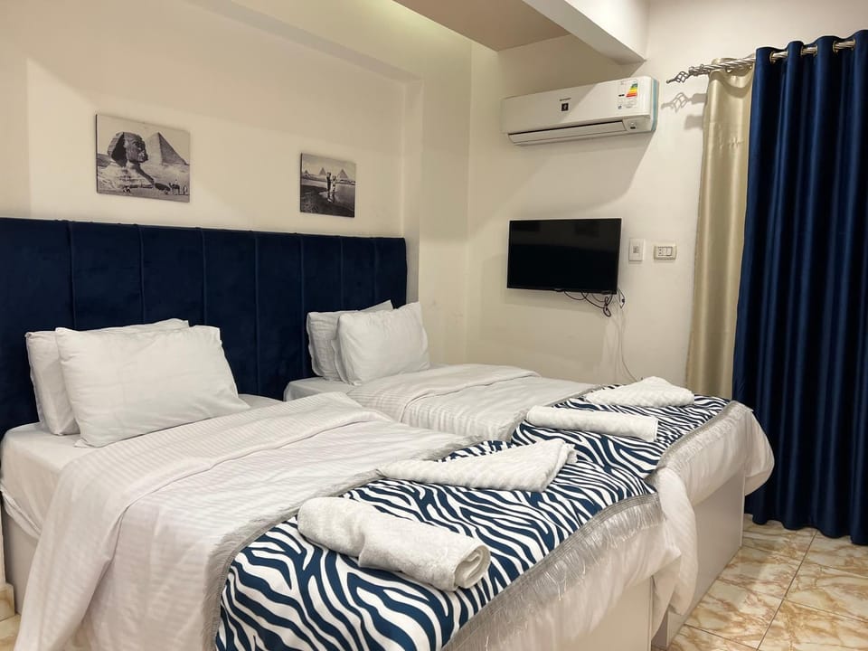Bed, TV and multimedia, air conditioner