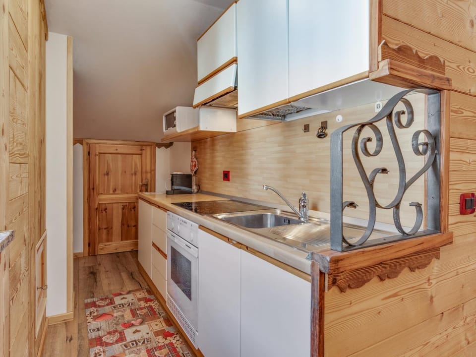 Kitchen or kitchenette, stove, kitchen