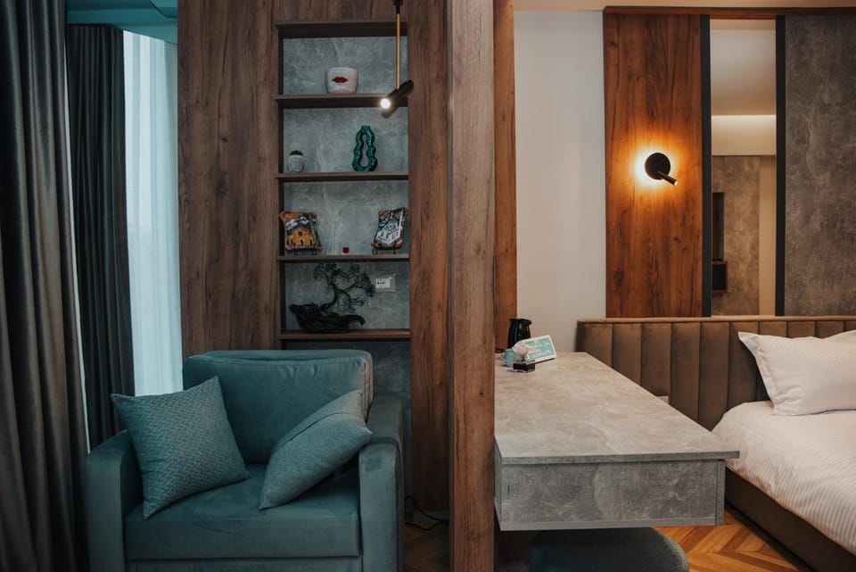 Bed, Living room, Seating area, Bedroom