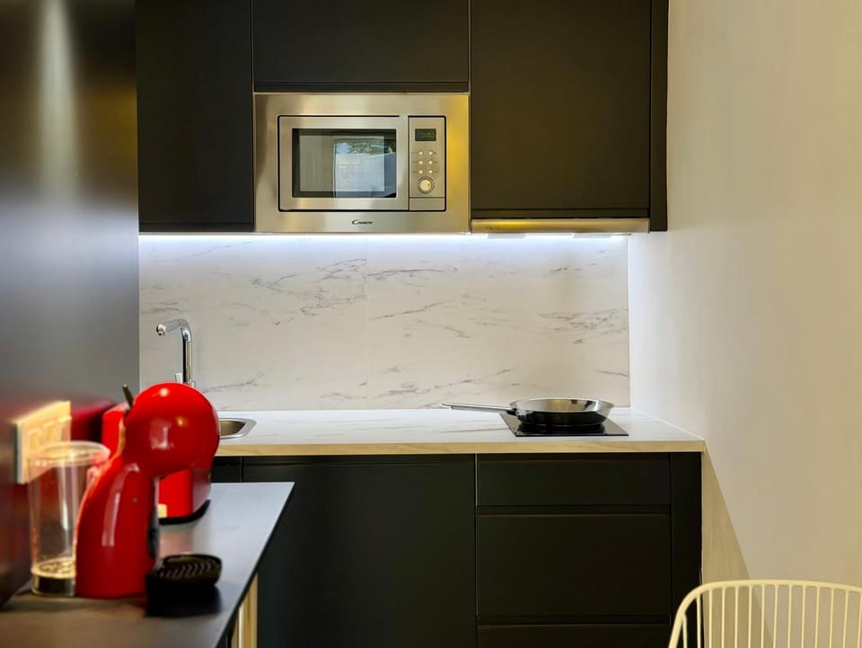 Kitchen or kitchenette, stove