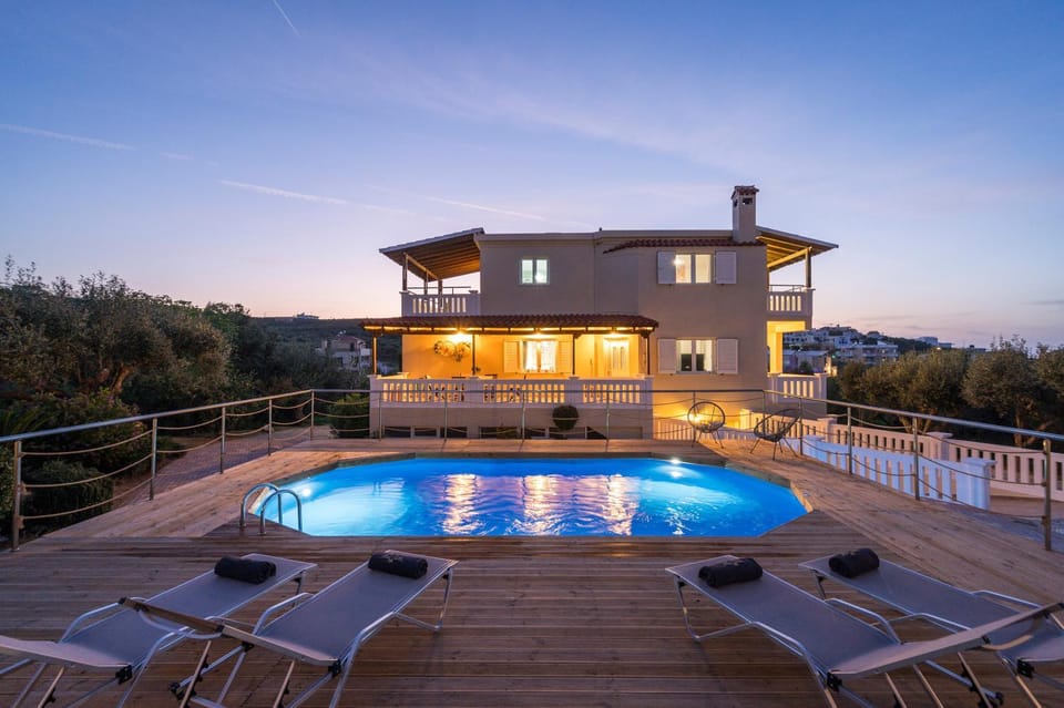 Property building, Patio, Day, Natural landscape, Pool view, Swimming pool, sunbed