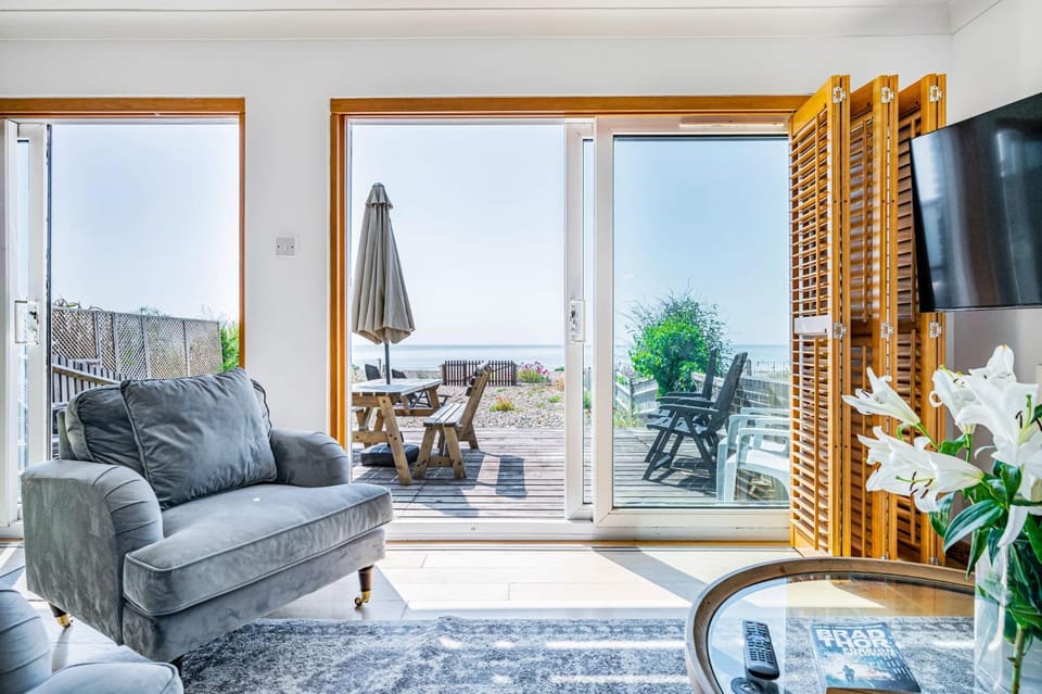 View (from property/room), Living room, Seating area, Sea view