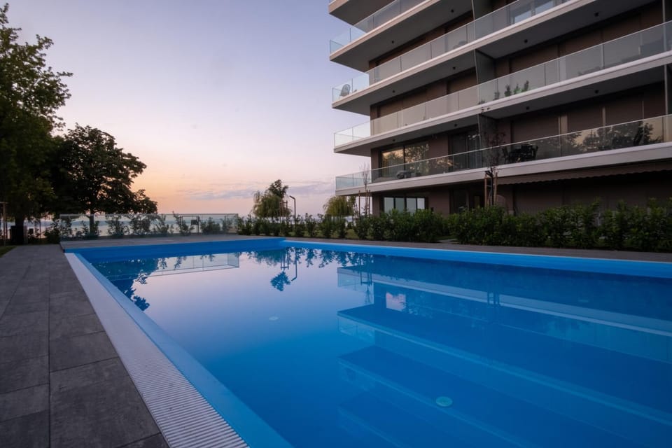 Property building, Swimming pool, Swimming pool, Sunset