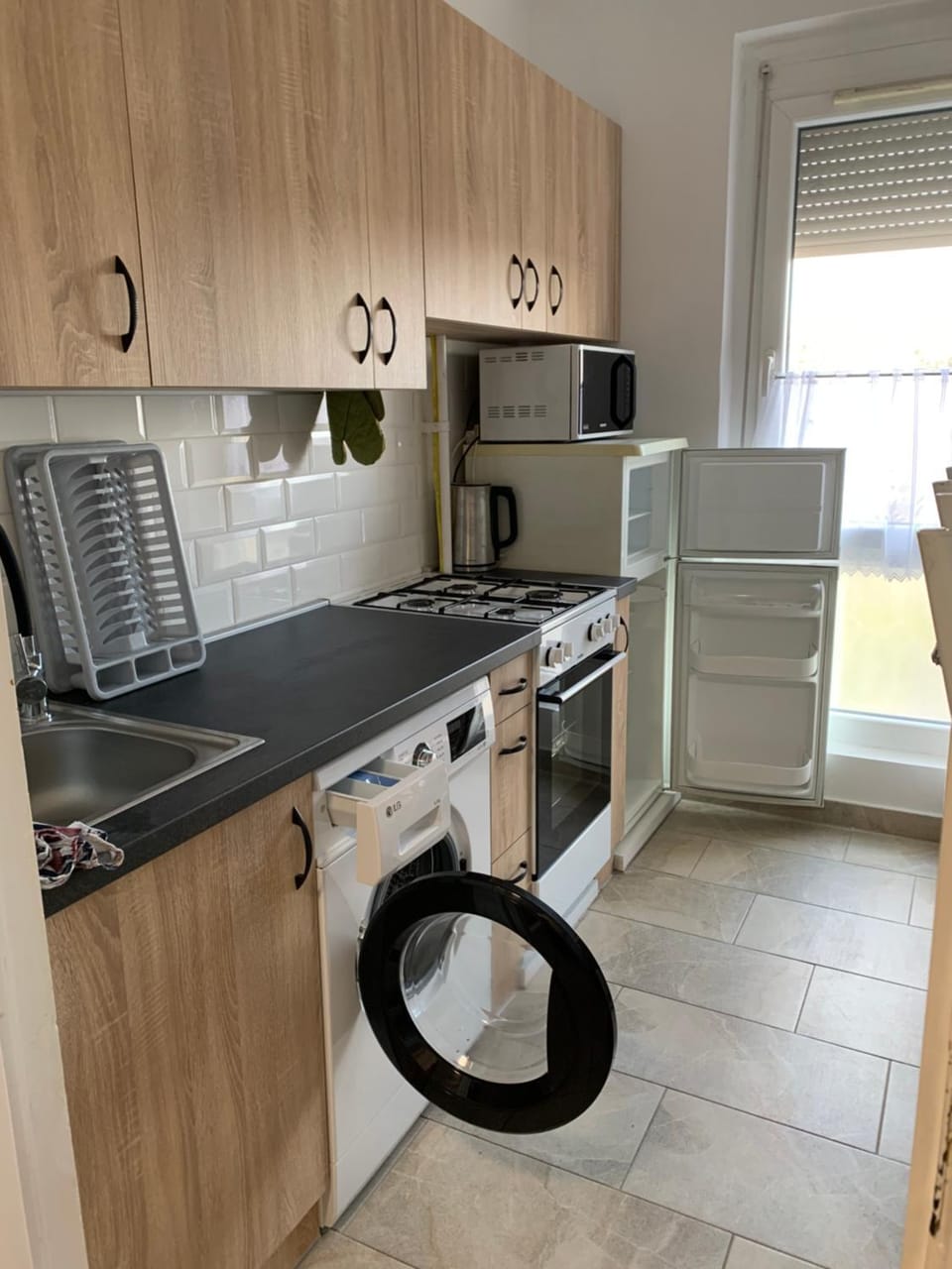 Kitchen or kitchenette, oven, toaster