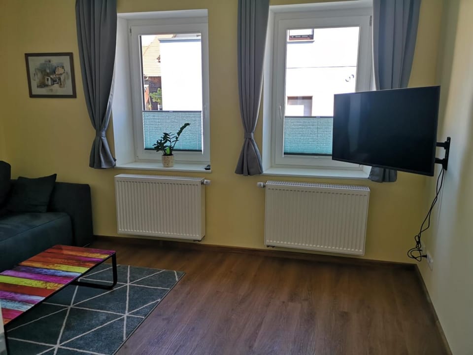 Communal lounge/ TV room, TV and multimedia, Living room, Seating area, Evening entertainment