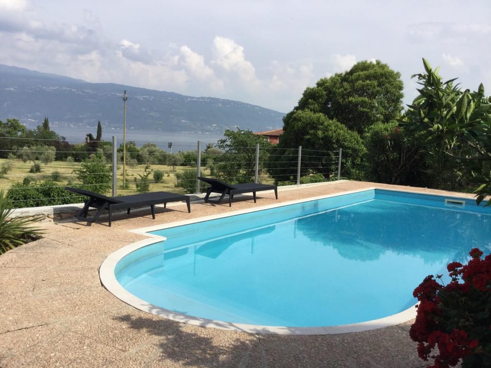 Property building, Living room, Swimming pool