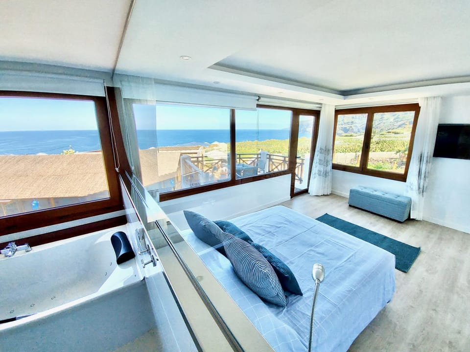 Nearby landmark, Spring, Bed, Day, Natural landscape, Activities, Solarium, Bathroom, TV and multimedia, View (from property/room), Balcony/Terrace, Photo of the whole room, Seating area, Beach, Hiking, Evening entertainment, Animals, Animals, Animals, Bedroom, Pets, Pets, Pets, Landmark view, Mountain view, Sea view, Area and facilities, Location, Sunrise, Sunset, Bath, Parking, furniture, hair dryier, internet, pet friendly, pet friendly, storage, towels, wardrobe