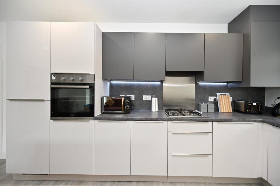 Kitchen or kitchenette, oven, toaster