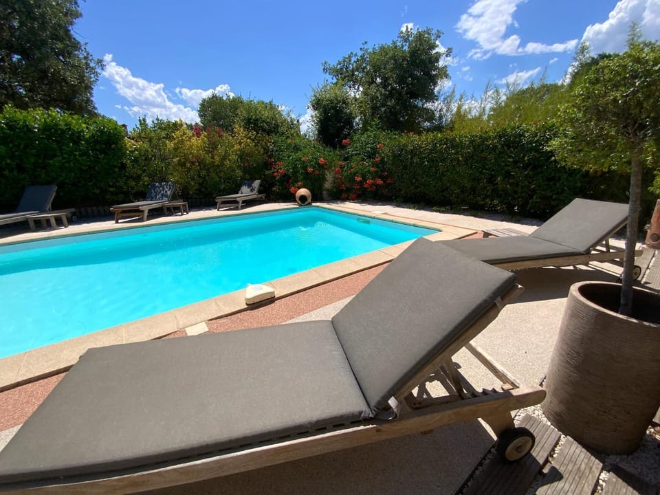 Swimming pool, sunbed