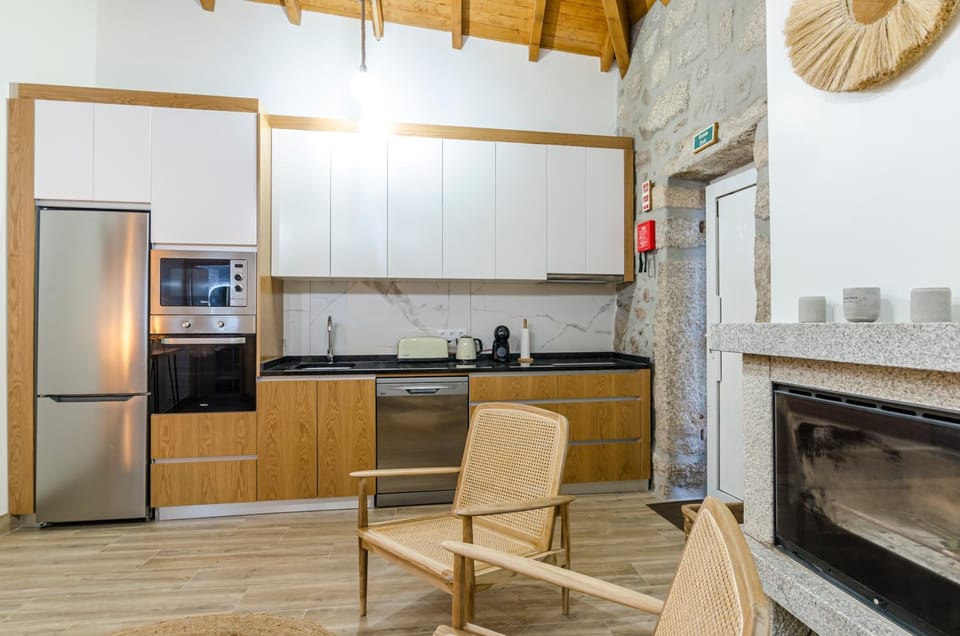 Kitchen or kitchenette, dishwasher, oven, stove, toaster