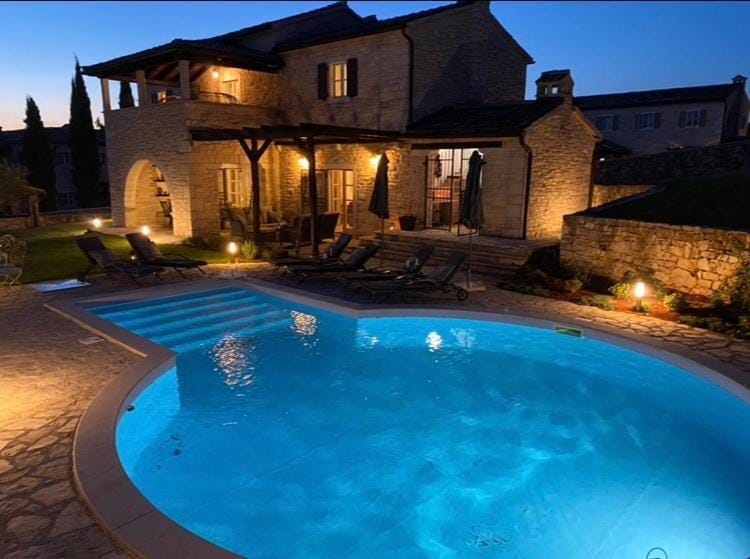 Property building, Patio, Night, Pool view, Swimming pool, sunbed