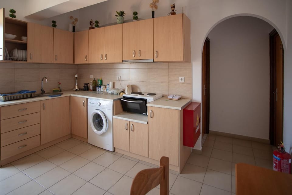 Kitchen or kitchenette, oven, stove, toaster, washing machine, kitchen