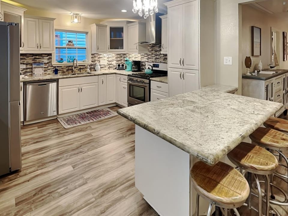 Kitchen or kitchenette, Seating area, furniture, microwave, oven, stove, kitchen