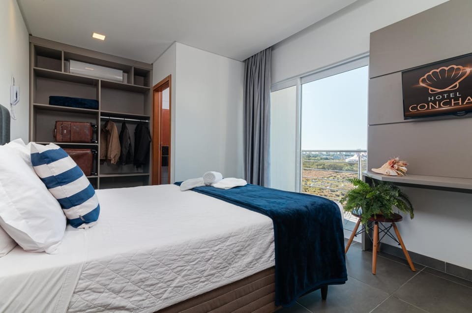Bed, Photo of the whole room, Bedroom, towels, air conditioner