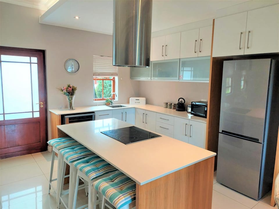 Kitchen or kitchenette, dishwasher, oven, stove, toaster