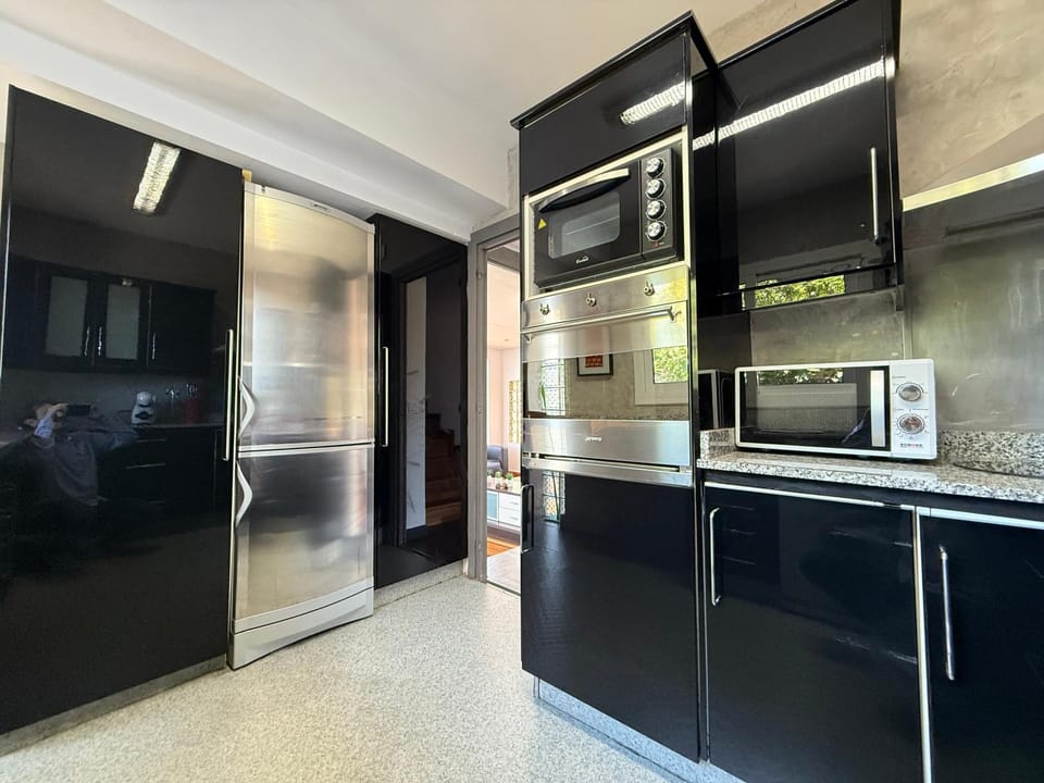 Kitchen or kitchenette, oven