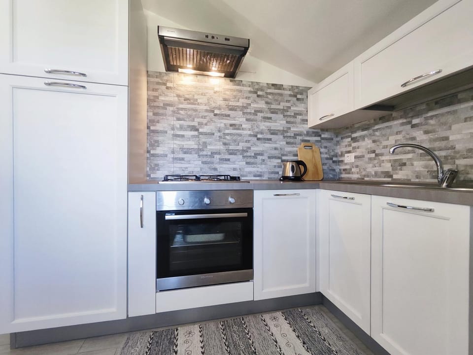 Kitchen or kitchenette, stove