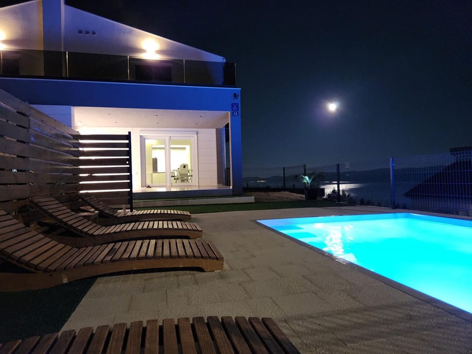 Property building, Night, Swimming pool, sunbed