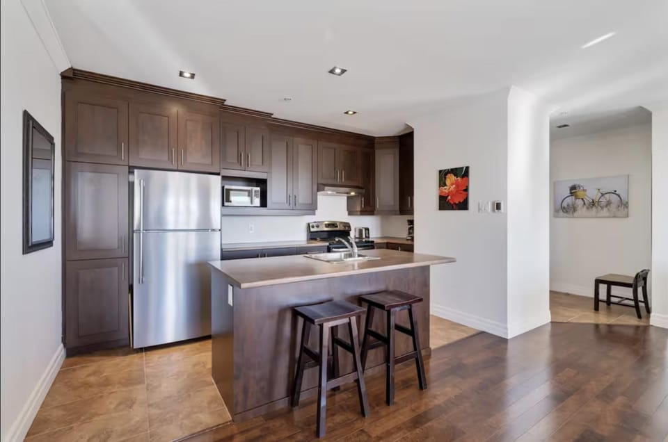Kitchen or kitchenette, dishwasher, oven, stove, toaster