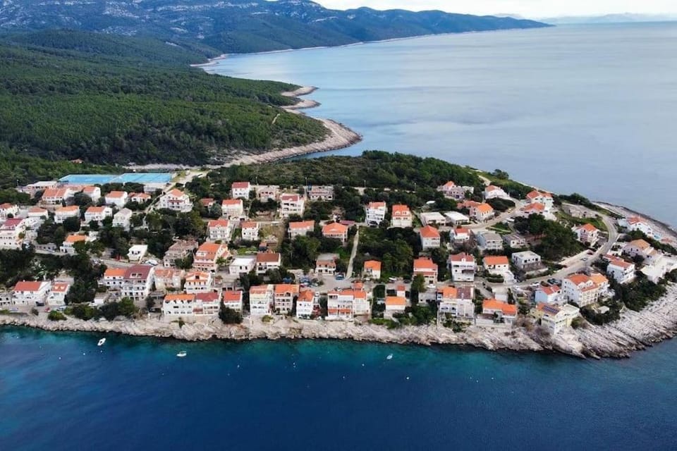 Property building, Day, Natural landscape, Bird's eye view, Beach, City view