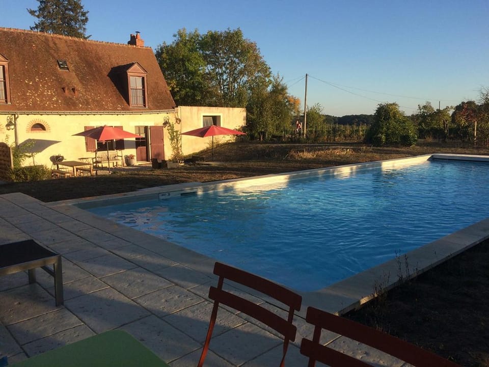 Property building, Swimming pool, Sunset