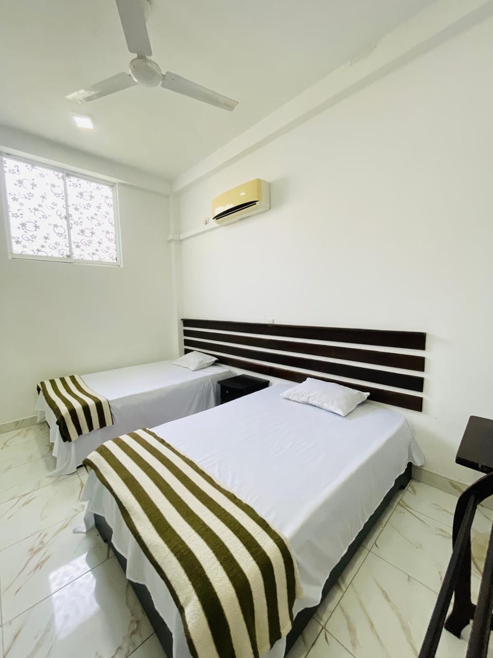 Photo of the whole room, air conditioner
