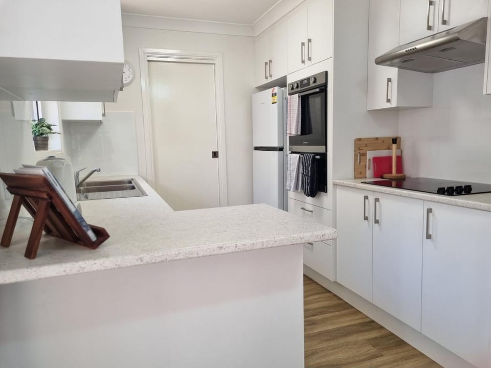 Kitchen or kitchenette, oven, stove