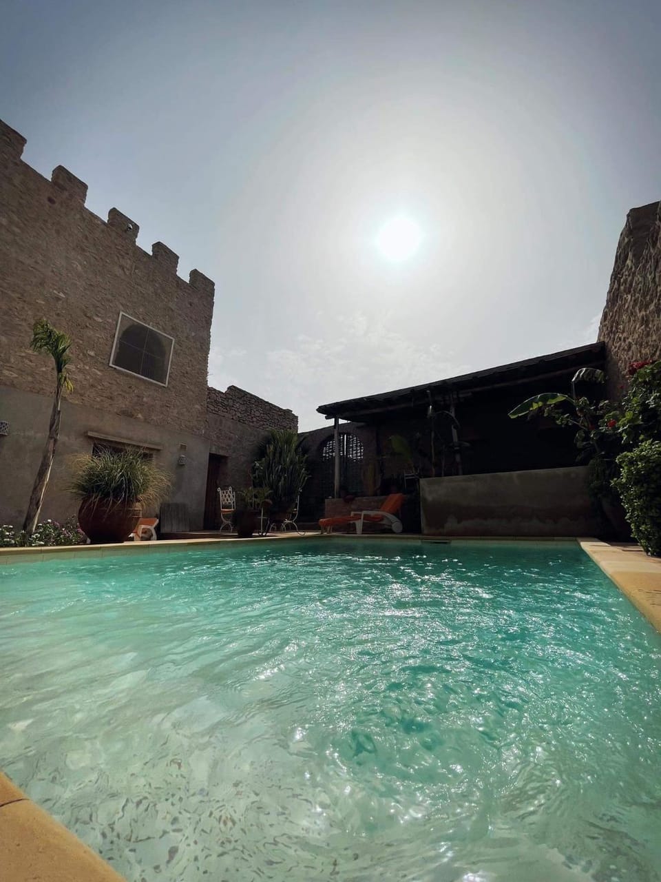 Swimming pool, sunbed