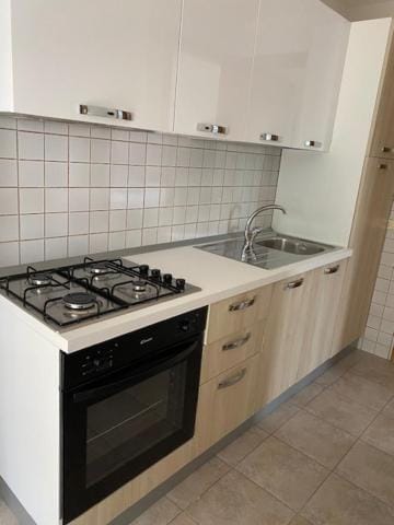 Kitchen or kitchenette, stove