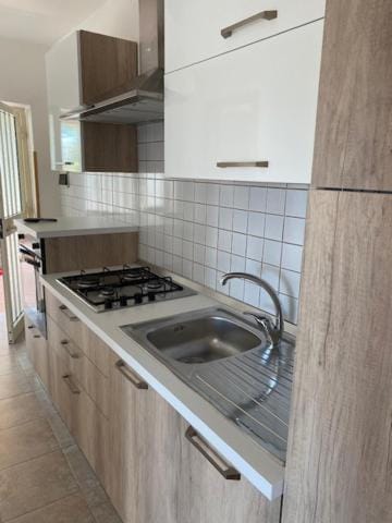 Kitchen or kitchenette, stove