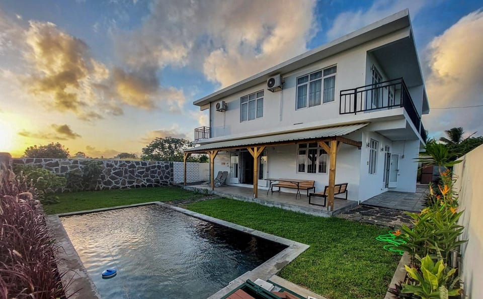 Property building, Swimming pool, Sunset