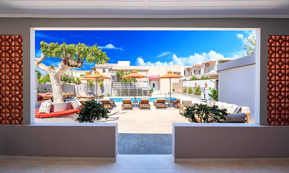 Property building, Patio, Day, Garden, View (from property/room), Balcony/Terrace, Garden view, Pool view, Swimming pool, sunbed