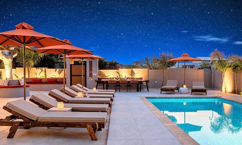 Patio, Day, Night, Natural landscape, Seating area, Pool view, Swimming pool, sunbed