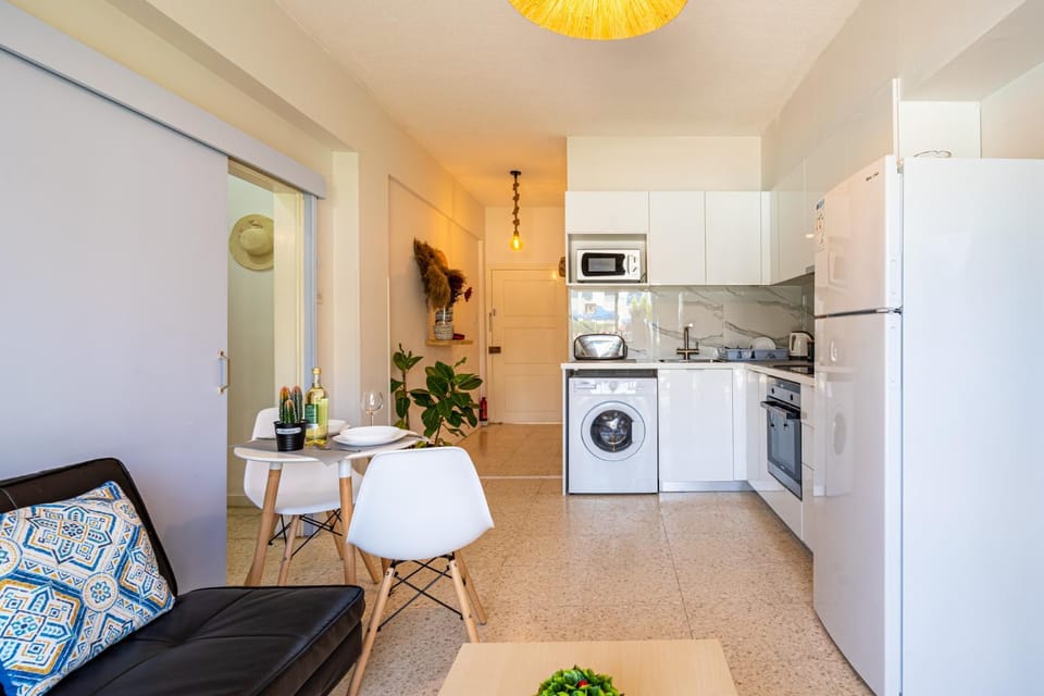 Living room, Seating area, Dining area, microwave, oven, stove, toaster, washing machine