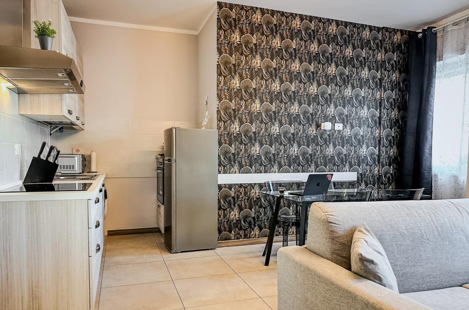 Kitchen or kitchenette, Living room, Seating area, oven, stove