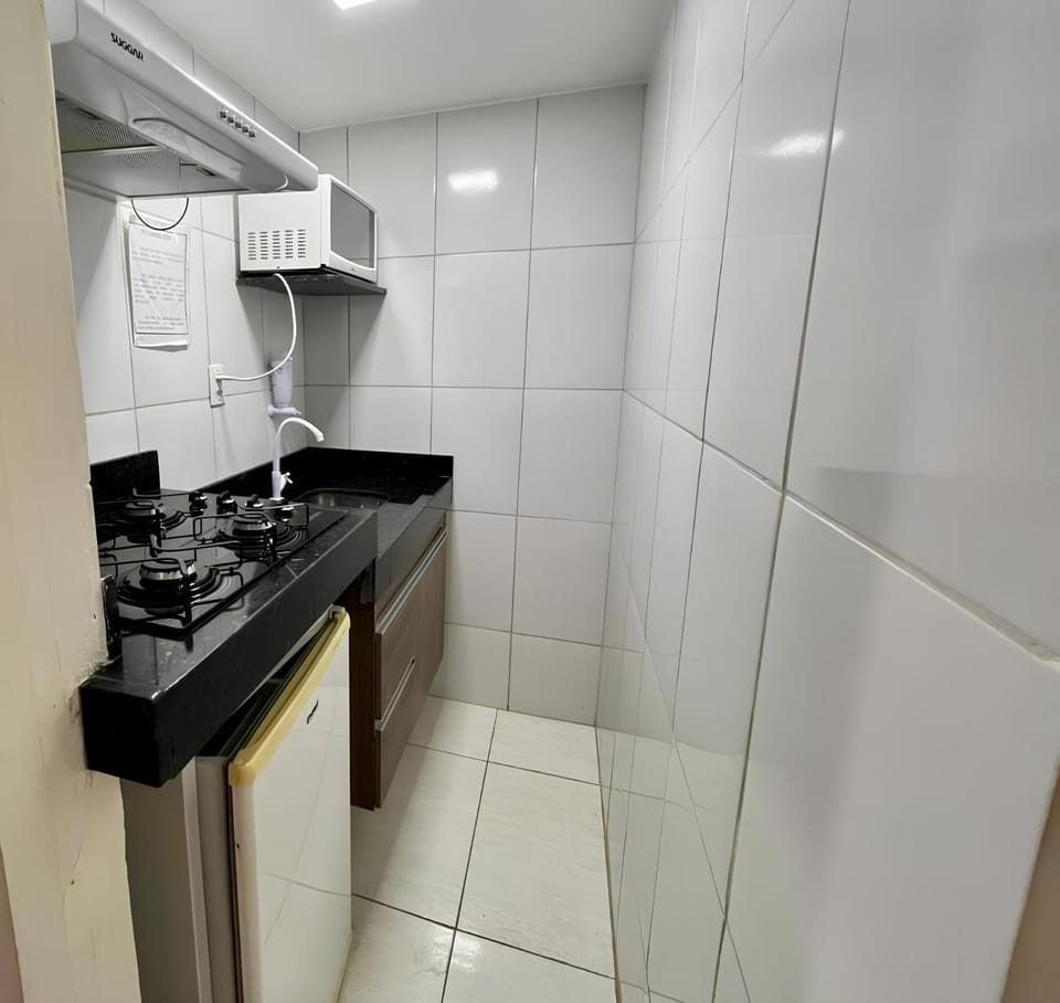Kitchen or kitchenette, minibar, stove