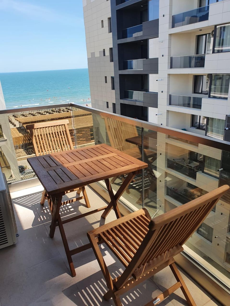 Property building, Patio, Day, Natural landscape, View (from property/room), Balcony/Terrace, Living room, Seating area, Dining area, Sea view, sunbed