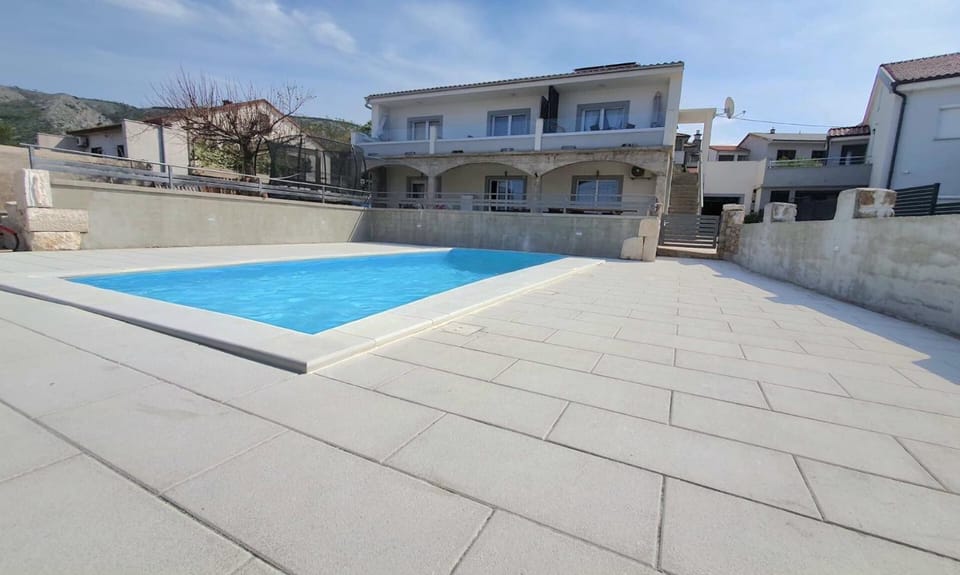 Property building, Patio, Day, Pool view, Swimming pool