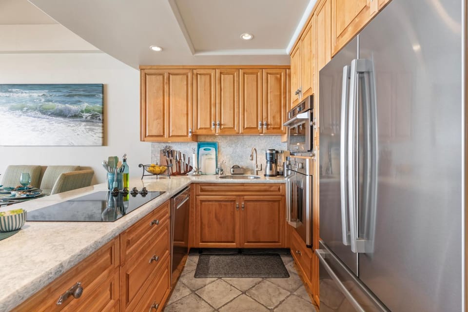 Kitchen or kitchenette, dishwasher, oven, stove