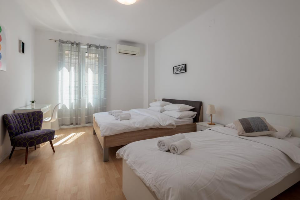 Bed, Photo of the whole room, Bedroom, towels, air conditioner