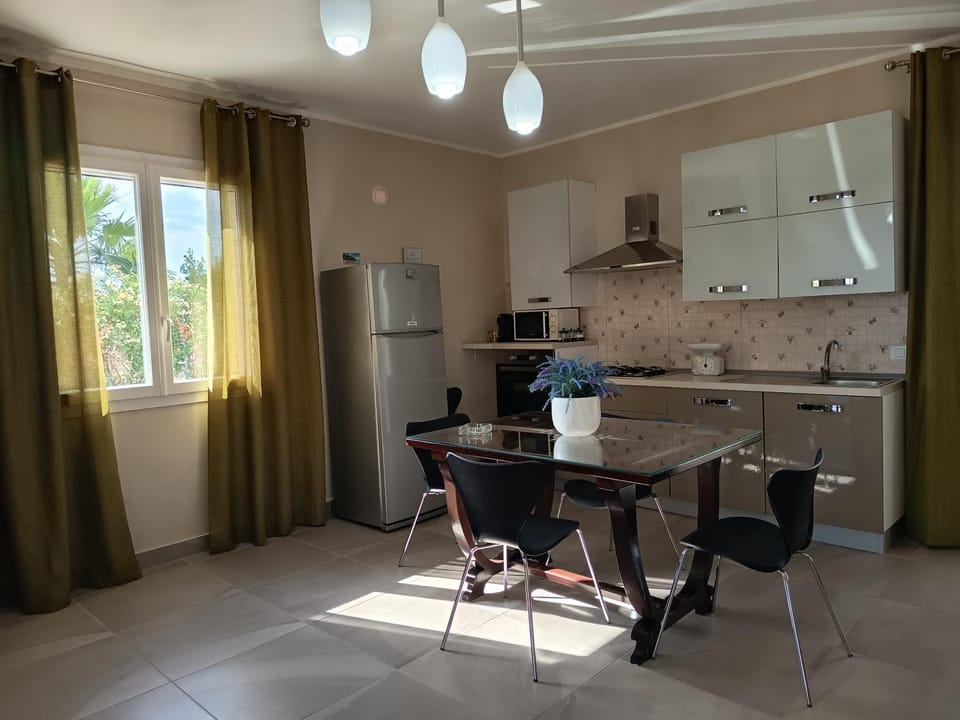 Kitchen or kitchenette, Living room, Dining area, oven, stove, toaster