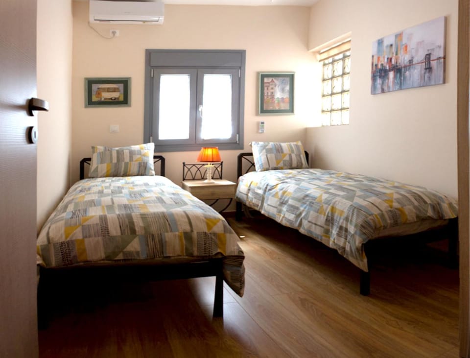 Photo of the whole room, Bedroom, air conditioner