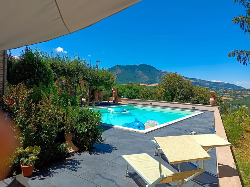 Property building, Spring, Day, Natural landscape, Balcony/Terrace, Mountain view, Pool view, Swimming pool, Swimming pool, sunbed