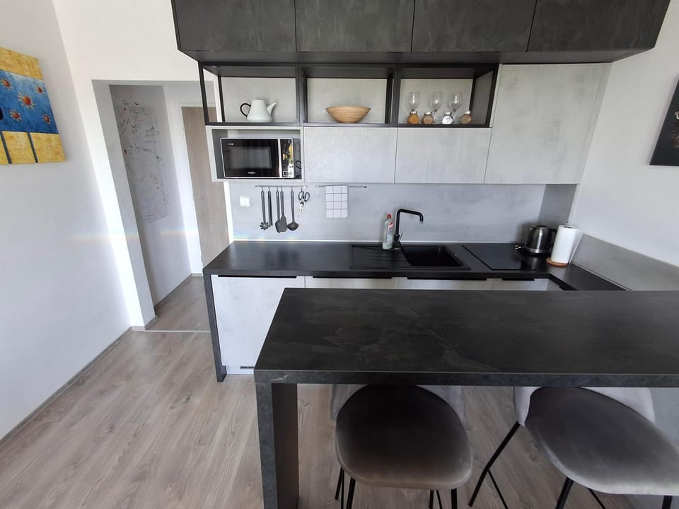 Kitchen or kitchenette, stove