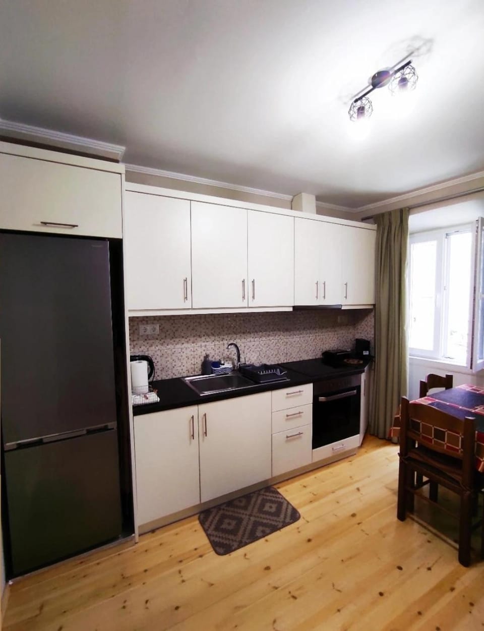Kitchen or kitchenette, oven, stove