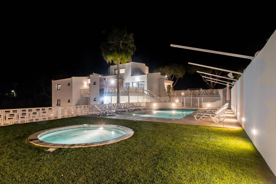 Property building, Night, Swimming pool