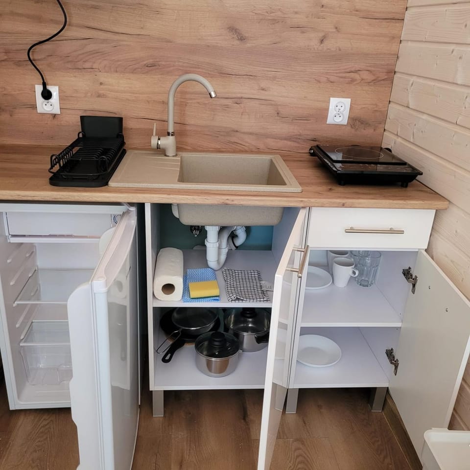 Kitchen or kitchenette, hair dresser